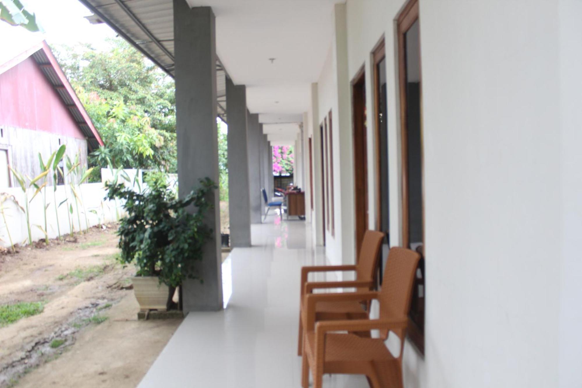 Wl Guesthouse Лабуан-Баджо Номер фото